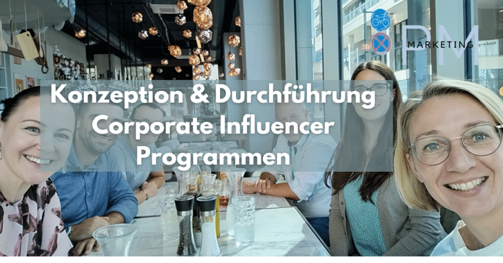 Konzeption und Durchführung von Corporate Influencer Programmen - Tisch mit Personen, die in die Kamera blicken